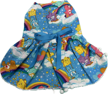 Dress -Care Bears  (retro)on Blue  trimmed with Pom Pom